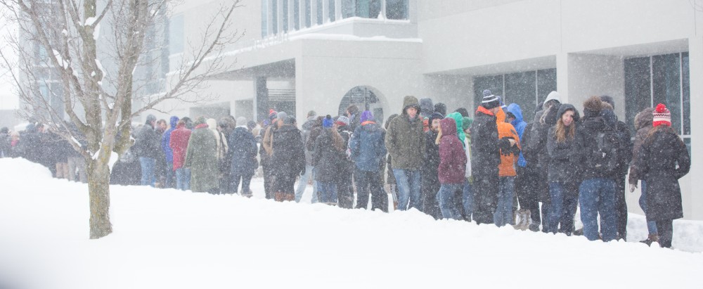 GVL / Kevin Sielaff - Touré, Vice columnist and well known author, visits Grand Valley's Allendale campus on a chilly Jan. 18, 2016. Hundreds of students gathered inside the Fieldhouse to listen to Touré's keynote speech; the students also participated in a silent march before the event.