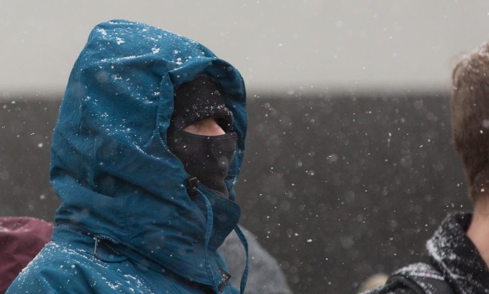 GVL / Kevin Sielaff - Touré, Vice columnist and well known author, visits Grand Valley's Allendale campus on a chilly Jan. 18, 2016. Hundreds of students gathered inside the Fieldhouse to listen to Touré's keynote speech; the students also participated in a silent march before the event.