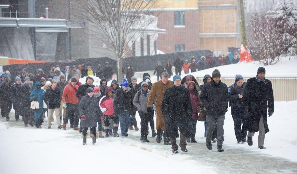 GVL / Kevin Sielaff - Touré, Vice columnist and well known author, visits Grand Valley's Allendale campus on a chilly Jan. 18, 2016. Hundreds of students gathered inside the Fieldhouse to listen to Touré's keynote speech; the students also participated in a silent march before the event.