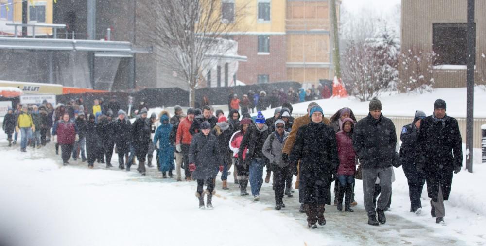 GVL / Kevin Sielaff - Touré, Vice columnist and well known author, visits Grand Valley's Allendale campus on a chilly Jan. 18, 2016. Hundreds of students gathered inside the Fieldhouse to listen to Touré's keynote speech; the students also participated in a silent march before the event.