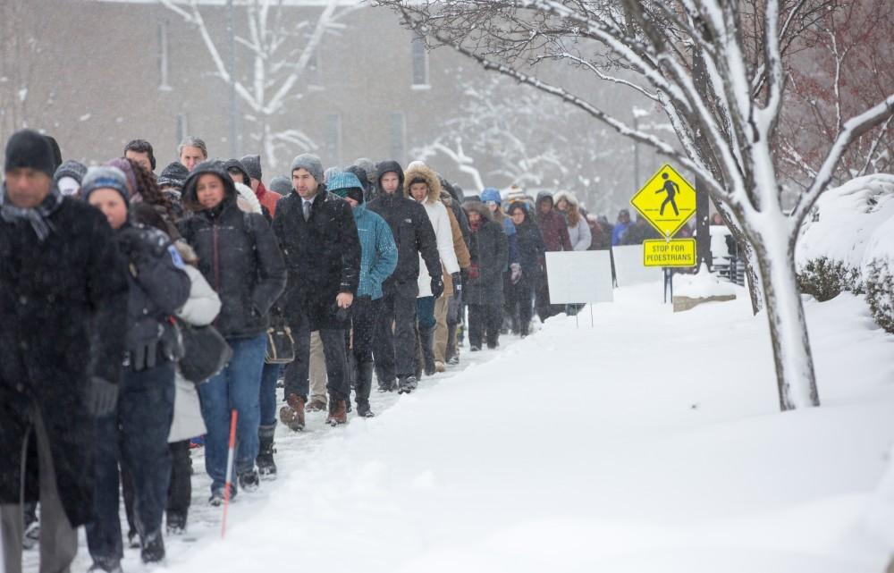 GVL / Kevin Sielaff - Touré, Vice columnist and well known author, visits Grand Valley's Allendale campus on a chilly Jan. 18, 2016. Hundreds of students gathered inside the Fieldhouse to listen to Touré's keynote speech; the students also participated in a silent march before the event.