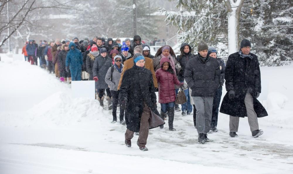 GVL / Kevin Sielaff - Touré, Vice columnist and well known author, visits Grand Valley's Allendale campus on a chilly Jan. 18, 2016. Hundreds of students gathered inside the Fieldhouse to listen to Touré's keynote speech; the students also participated in a silent march before the event.