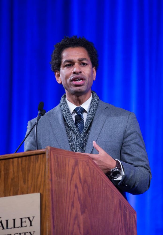 GVL / Kevin Sielaff - Touré, Vice columnist and well known author, visits Grand Valley's Allendale campus on a chilly Jan. 18, 2016. Hundreds of students gathered inside the Fieldhouse to listen to Touré's keynote speech; the students also participated in a silent march before the event.