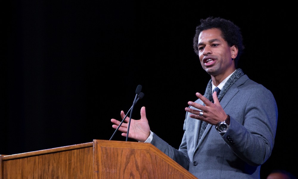 GVL / Kevin Sielaff - Touré, Vice columnist and well known author, visits Grand Valley's Allendale campus on a chilly Jan. 18, 2016. Hundreds of students gathered inside the Fieldhouse to listen to Touré's keynote speech; the students also participated in a silent march before the event.