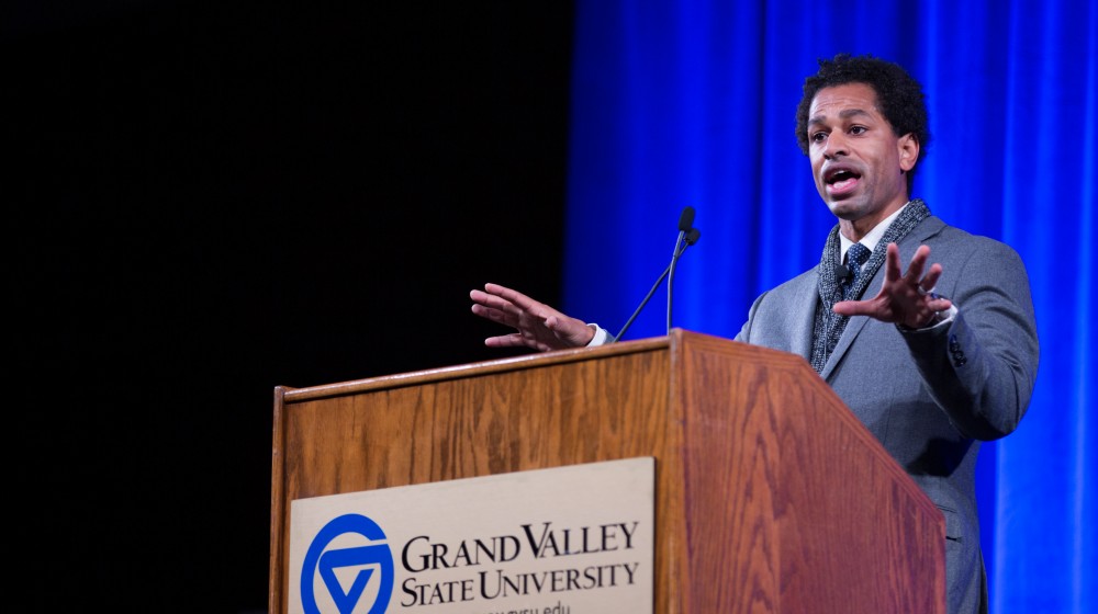 GVL / Kevin Sielaff - Touré, Vice columnist and well known author, visits Grand Valley's Allendale campus on a chilly Jan. 18, 2016. Hundreds of students gathered inside the Fieldhouse to listen to Touré's keynote speech; the students also participated in a silent march before the event.