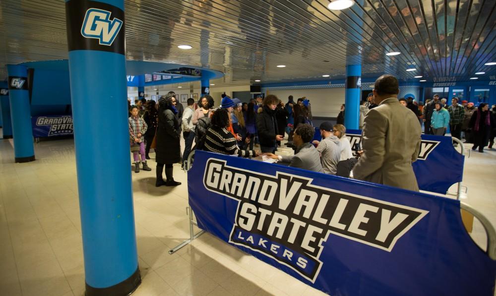 GVL / Kevin Sielaff - Touré, Vice columnist and well known author, visits Grand Valley's Allendale campus on a chilly Jan. 18, 2016. Hundreds of students gathered inside the Fieldhouse to listen to Touré's keynote speech; the students also participated in a silent march before the event. After the event's conclusion, a book signing takes place within the Fielhouse Arena.