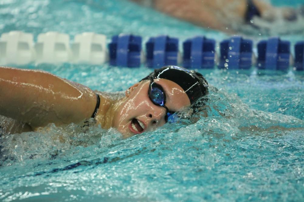 Emily Toro swims freestyle against Findlay on Jan 23 in Allendale, MI. 