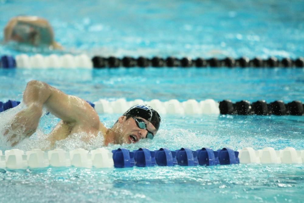 Matt Stevens, swimming freestyle, competes against Findlay on Jan 23 in Allendale, MI. 