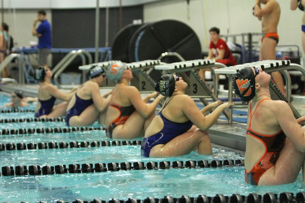 In place to take off, member of the Swim and Dive team from Grand Valley compete against members of the Findlay Swim and Dive team on Jan 23 in Allendale, MI.