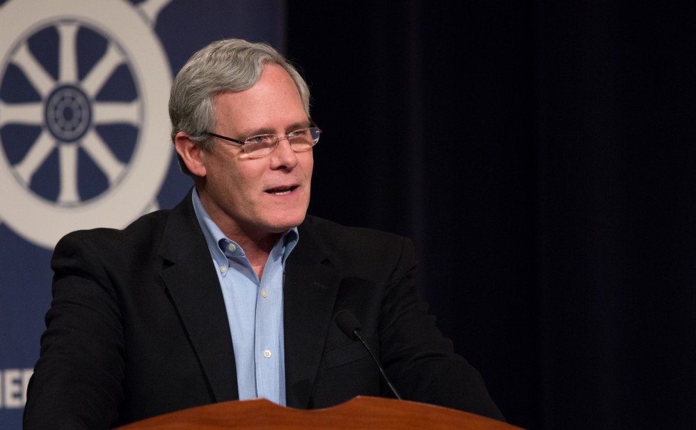 GVL / Kevin Sielaff - Gleaves Whitney pays tribute to Ralph Hauenstein before the start of Senator Warren's wheelhouse talk at Loosemore Auditorium on Grand Valley's Pew Campus Jan. 22, 2016.