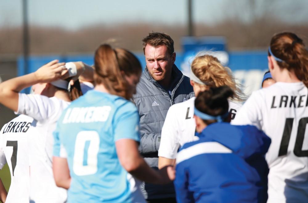 GVL / Kevin Sielaff -  Head coach Jeff Hosler consults his team before the match. Grand Valley squares off against Quincy in the second round of the women's soccer NCAA tournament Nov. 15 in Allendale. The Lakers take the victory with a final score of 6-0.