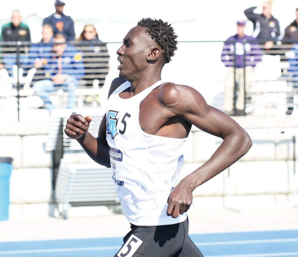GVL/Kevin Sielaff
Wuoi Mach runs in the Men's 1,500 meter race on the first day of competition. Grand Valley State University hosts, for the second year in a row, the annual NCAA Division II Track and Field Championship competitions Thursday, May 21, 2015 through Saturday, May 23, 2015. 
