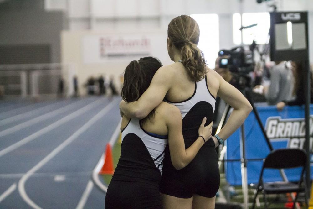 GVL / Sara Carte
Grand Valley Track and Field long distance runners, Rachel Walters (right) and Katie Shaheen (left), celebrate after the Eight Hundred Meter Run during the GVSU Mike Lints Alumni Open Meet in the Kelly Family Sports Center on Saturday, Jan. 30, 2016.