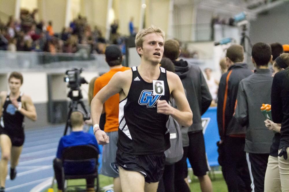 GVL / Sara Carte
Grand Valley Track and Field long distance runner, Ethan Barnes, runs the 3000 Meter Run during the GVSU Mike Lints Alumni Open Meet in the Kelly Family Sports Center on Saturday, Jan. 30, 2016.