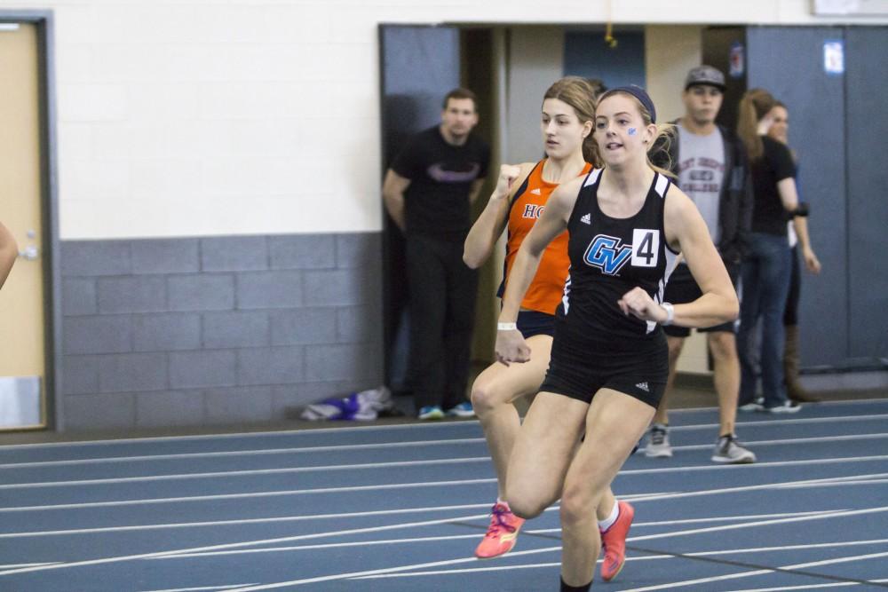 GVL / Sara Carte
Grand Valley Track and Field sprinter, Heather Johnson, runs the four hundred meter dash during the GVSU Mike Lints Alumni Open Meet in the Kelly Family Sports Center on Saturday, Jan. 30, 2016.