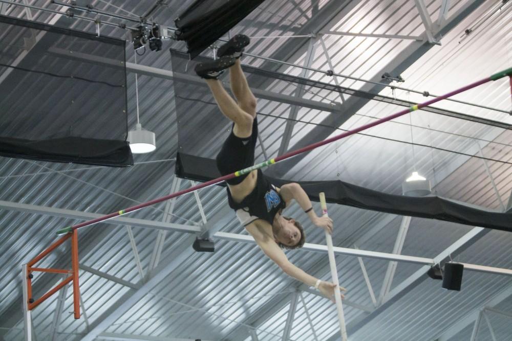 GVL / Sara Carte
Grand Valley Track and Field vaulter, Jacob Burnham, pole vaults during the GVSU Mike Lints Alumni Open Meet in the Kelly Family Sports Center on Saturday, Jan. 30, 2016.