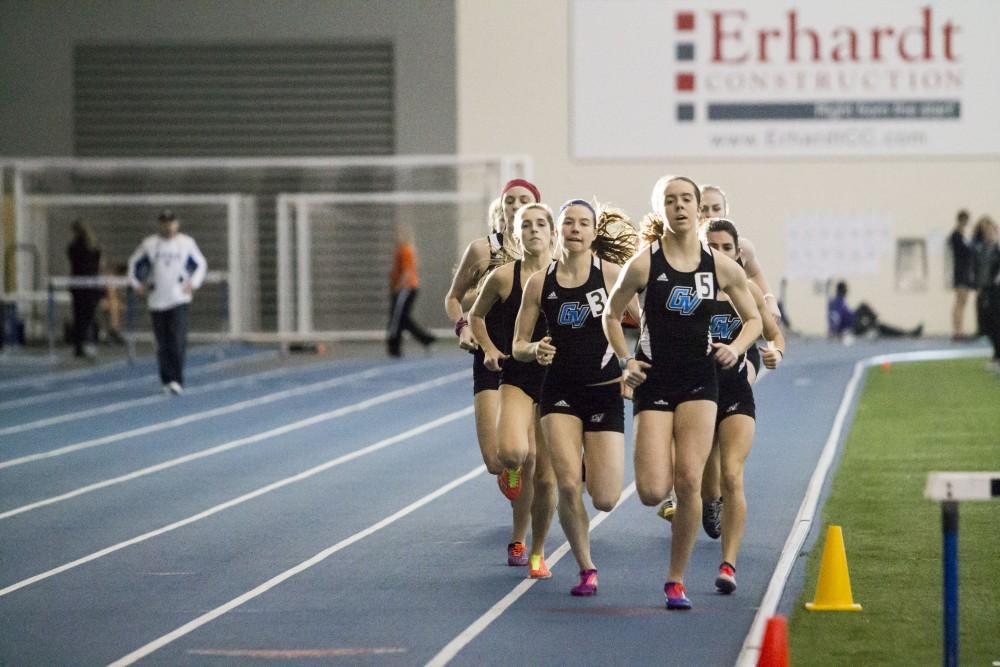 GVL / Sara Carte
Grand Valley Track and Field long distance runners run the eight hundred meter run during the GVSU Mike Lints Alumni Open Meet in the Kelly Family Sports Center on Saturday, Jan. 30, 2016.