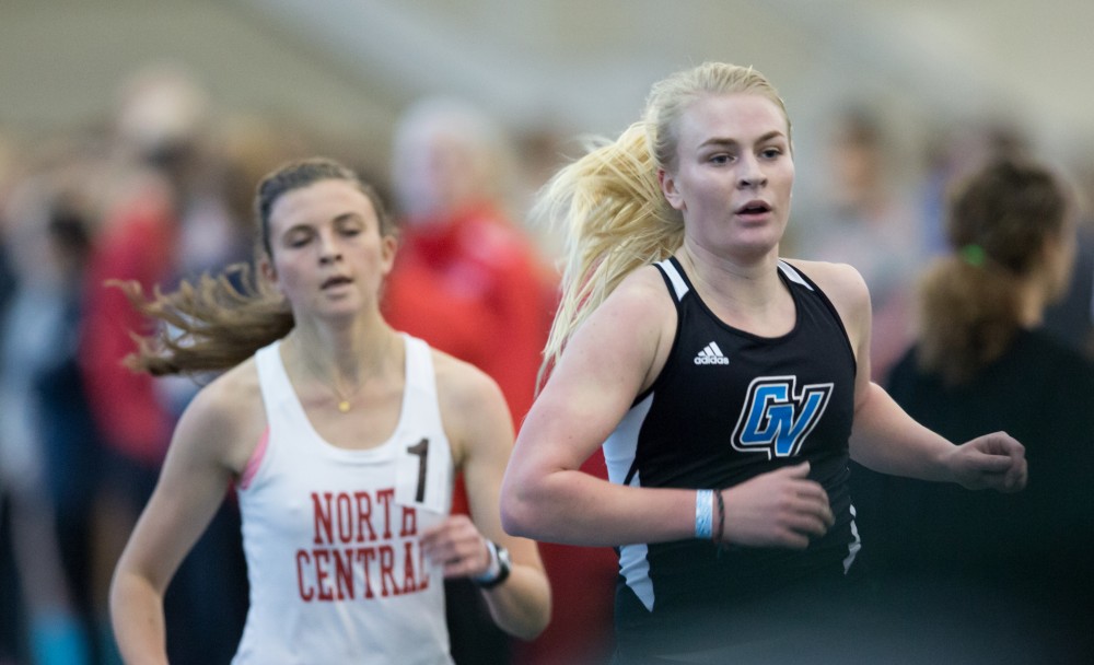 GVL / Kevin Sielaff - Marta McLaughlin participates in the women's mile run.  The Kelly Family Sports Center hosts the Bob Eubanks Open Jan. 15, 2016.