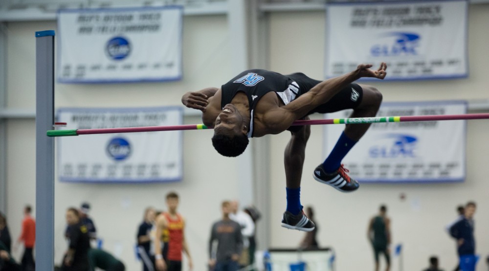 GVL / Kevin Sielaff - Tor'i Brooks participates in the men's high jump competition.  The Kelly Family Sports Center hosts the Bob Eubanks Open Jan. 15, 2016.