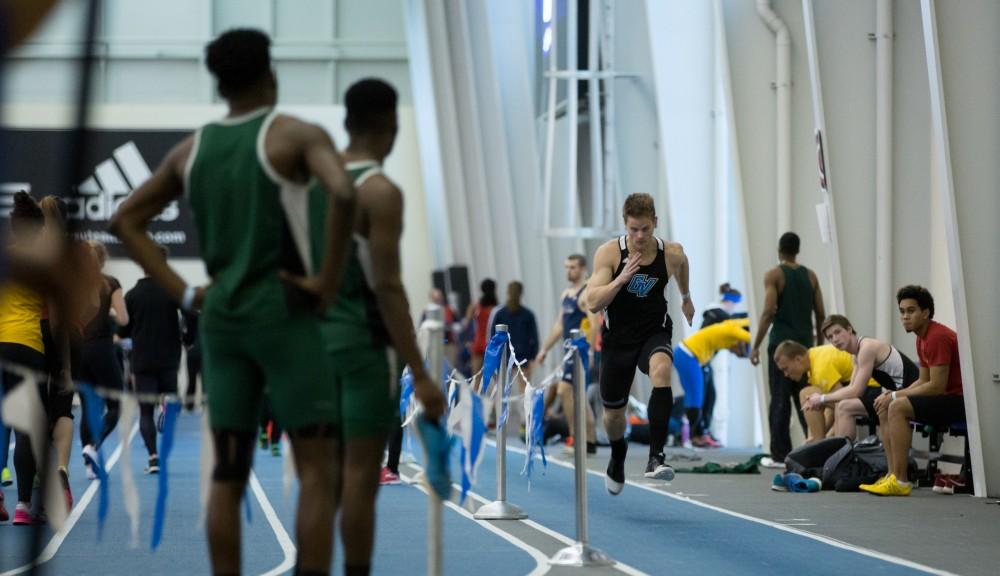 GVL / Kevin Sielaff -  Kyle Sawyer participates in the men's long jump competition.  The Kelly Family Sports Center hosts the Bob Eubanks Open Jan. 15, 2016.