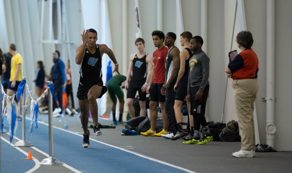 GVL / Kevin Sielaff - Tyler Pavliga participates in the men's long jump competition.  The Kelly Family Sports Center hosts the Bob Eubanks Open Jan. 15, 2016.