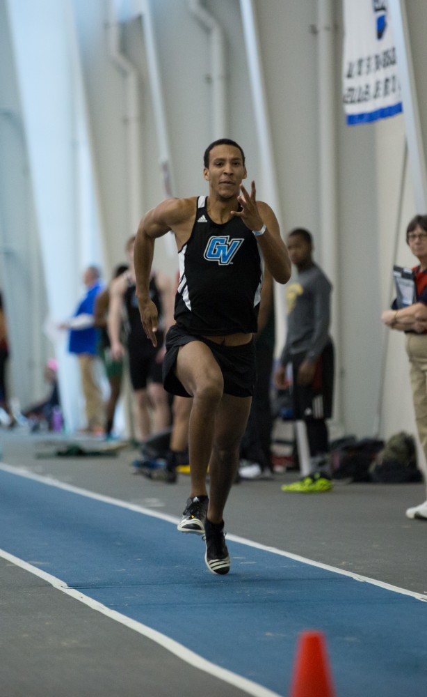 GVL / Kevin Sielaff - Tyler Pavliga participates in the men's long jump competition.  The Kelly Family Sports Center hosts the Bob Eubanks Open Jan. 15, 2016.