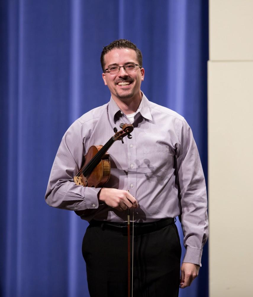 GVL / Kevin Sielaff - Andrew Uhe, former Grand Valley student, performs in the Louis Armstrong Theatre Jan. 14, 2016. Uhe, a native of West Michigan, currently lives in Texas where he performs with the symphony orchestras located in Victoria and Corpus Christi.