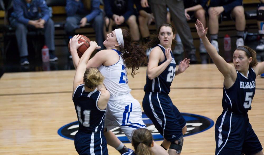 GVL / Kevin Sielaff - Kayla Dawson (23), hacked on the way to the basket, proceeds to shoot free throws.  The Lakers defeat the Chargers of Hillsdale College Saturday, Jan. 30, 2016 in Allendale.