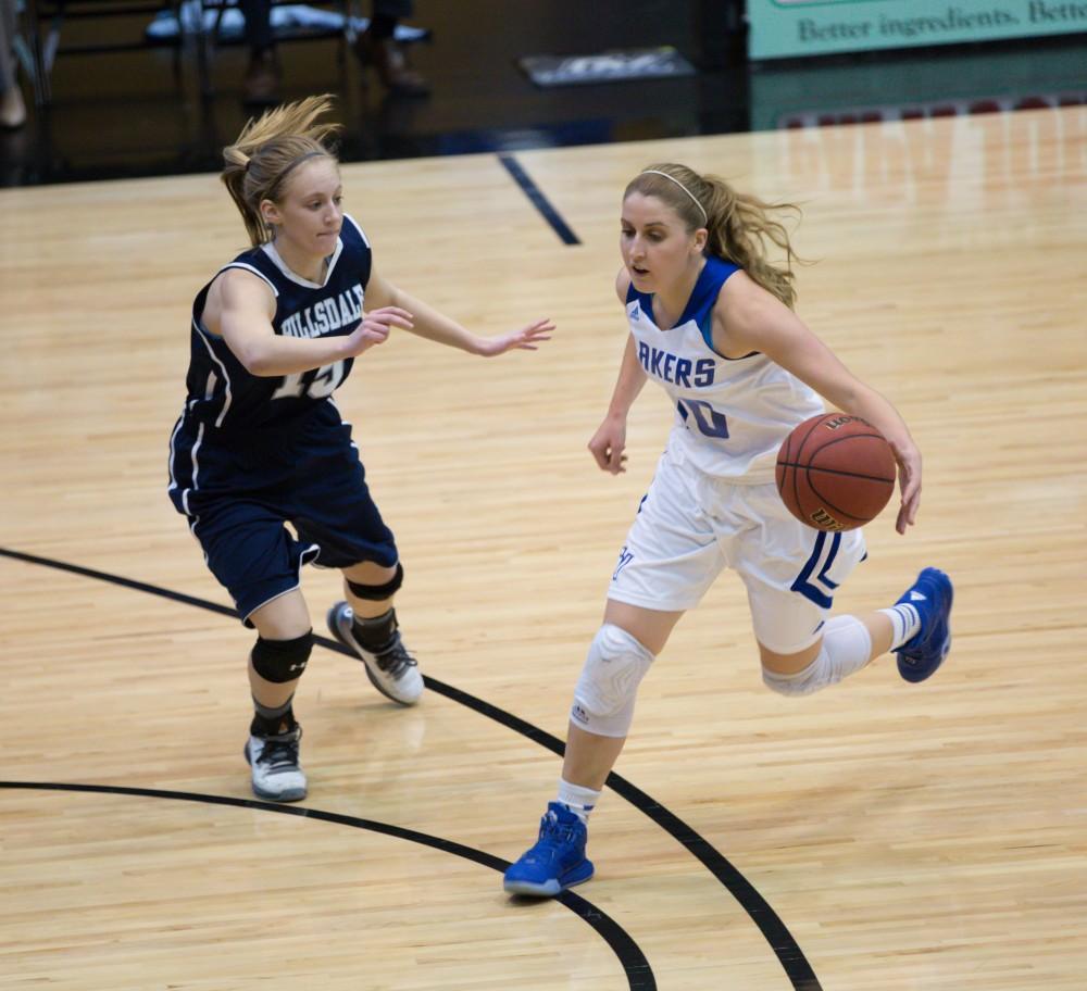 GVL / Kevin Sielaff - Taylor Lutz (10) dribbles the ball up court.  The Lakers defeat the Chargers of Hillsdale College Saturday, Jan. 30, 2016 in Allendale.