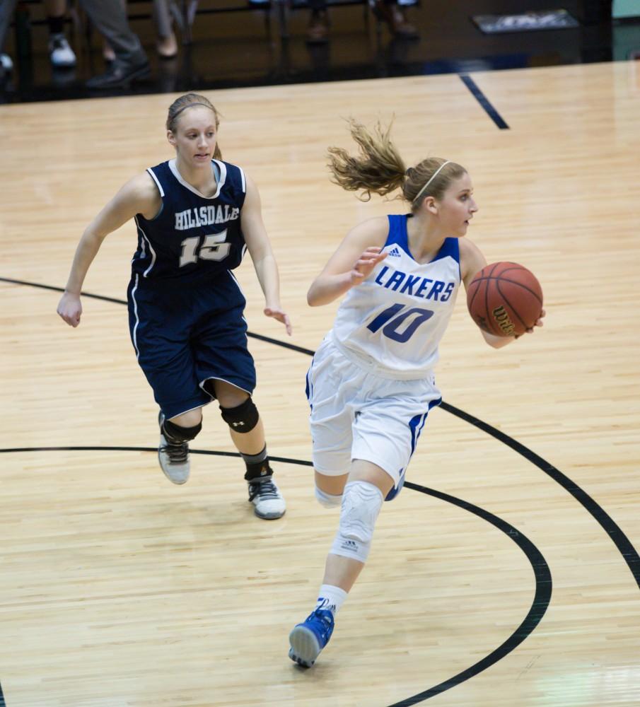 GVL / Kevin Sielaff - Taylor Lutz (10) dribbles the ball up court.  The Lakers defeat the Chargers of Hillsdale College Saturday, Jan. 30, 2016 in Allendale.