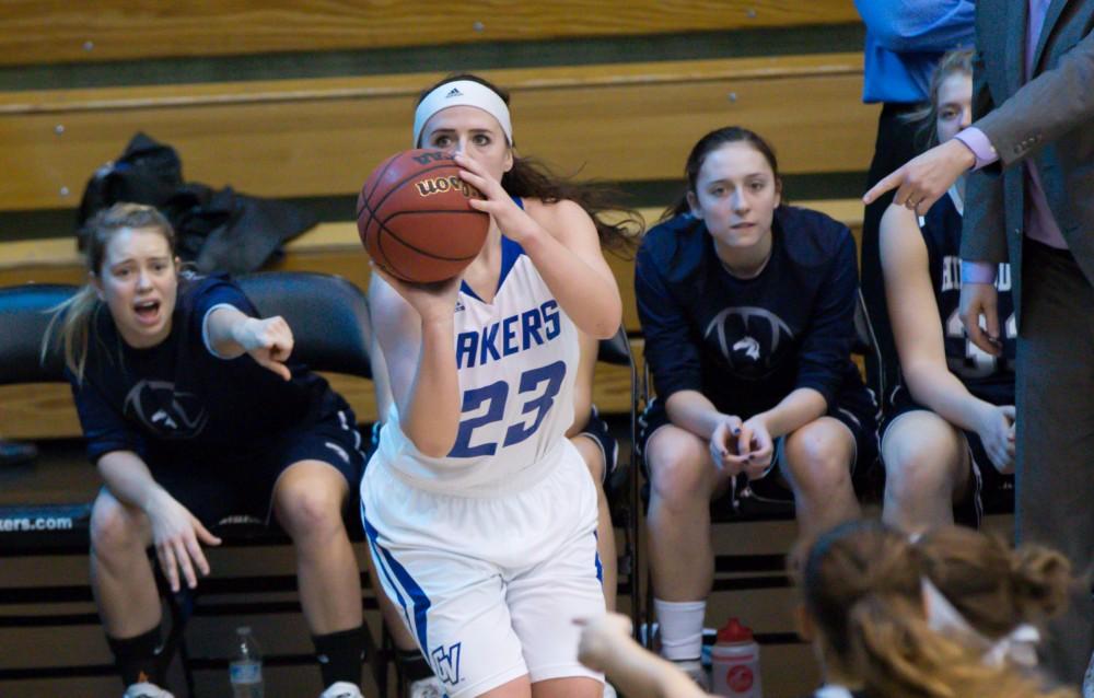 GVL / Kevin Sielaff - Kayla Dawson (23) squares up and prepares to try a three point shot.  The Lakers defeat the Chargers of Hillsdale College Saturday, Jan. 30, 2016 in Allendale.