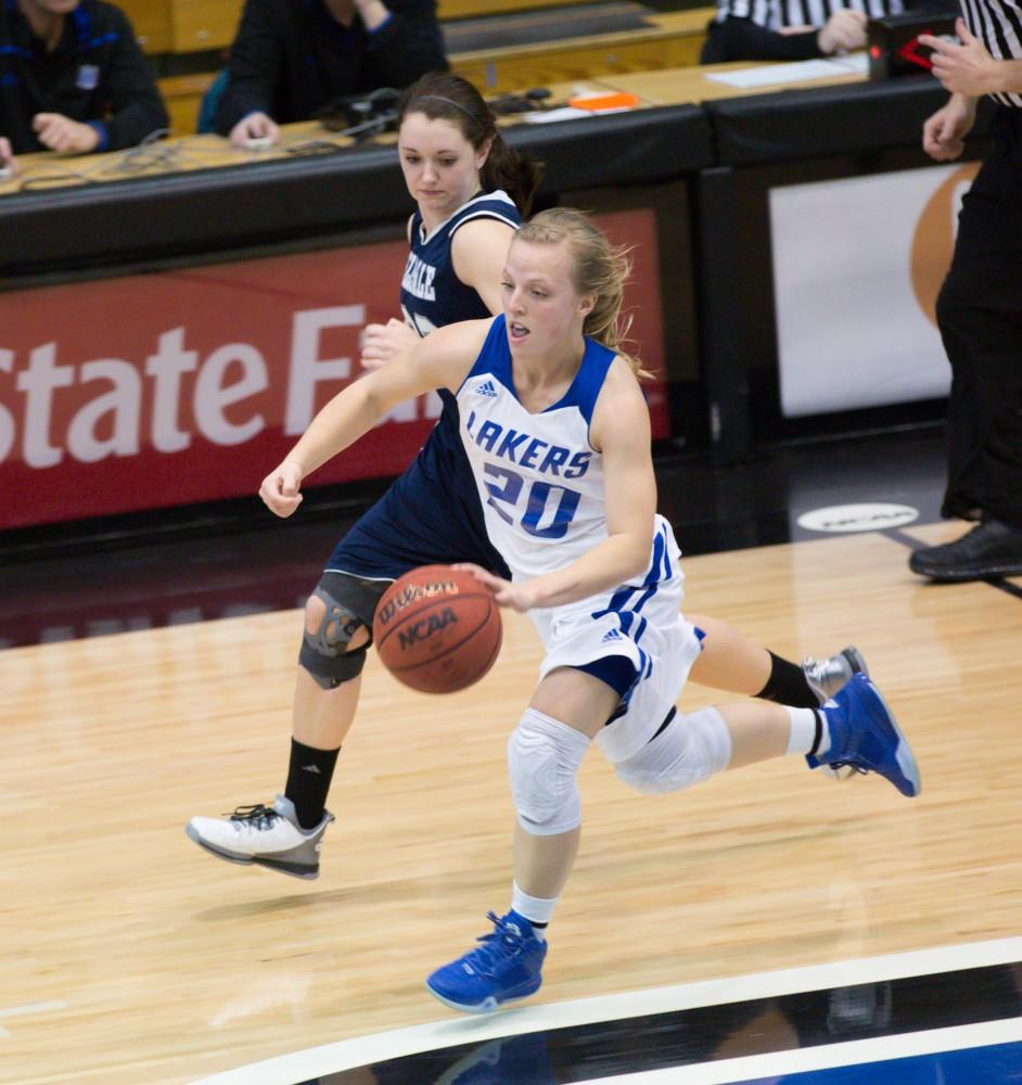 GVL / Kevin Sielaff - Janae Langs (20) charges up court.  The Lakers defeat the Chargers of Hillsdale College Saturday, Jan. 30, 2016 in Allendale.