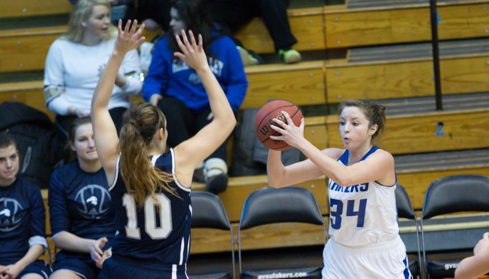 GVL / Kevin Sielaff - Bailey Cairnduff (34) picks up her dribble and looks to pass the ball.  The Lakers defeat the Chargers of Hillsdale College Saturday, Jan. 30, 2016 in Allendale.