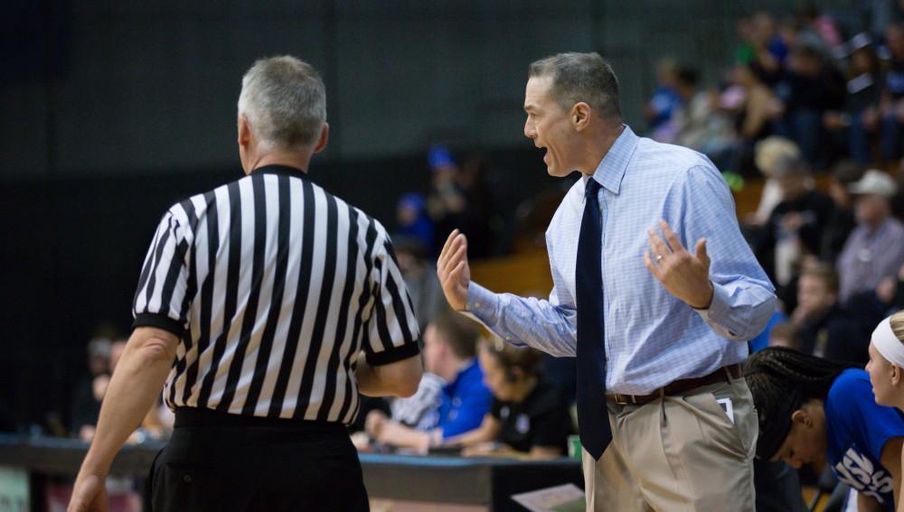 GVL / Kevin Sielaff - Head coach Mike Williams disputes a call with the referee.  The Lakers defeat the Chargers of Hillsdale College Saturday, Jan. 30, 2016 in Allendale.