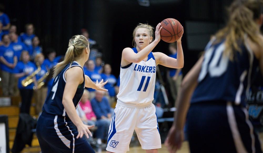 GVL / Kevin Sielaff - Piper Tucker (11) picks up her dribble and looks to pass the ball into the paint.  The Lakers defeat the Chargers of Hillsdale College Saturday, Jan. 30, 2016 in Allendale.