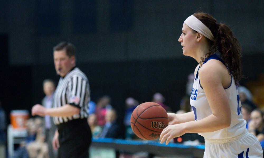 GVL / Kevin Sielaff - Kayla Dawson (23) dribbles the ball and looks to set-up a play.  The Lakers defeat the Chargers of Hillsdale College Saturday, Jan. 30, 2016 in Allendale.