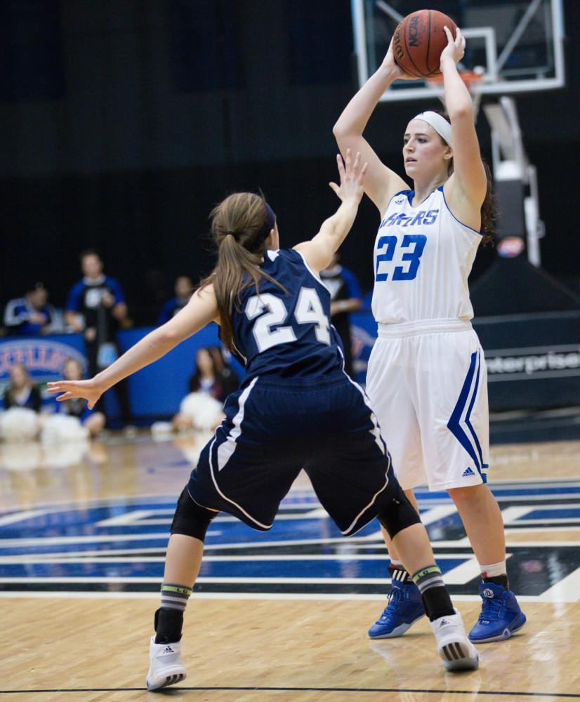 GVL / Kevin Sielaff - Kayla Dawson (23) picks up her dribble and looks to pass the ball.  The Lakers defeat the Chargers of Hillsdale College Saturday, Jan. 30, 2016 in Allendale.