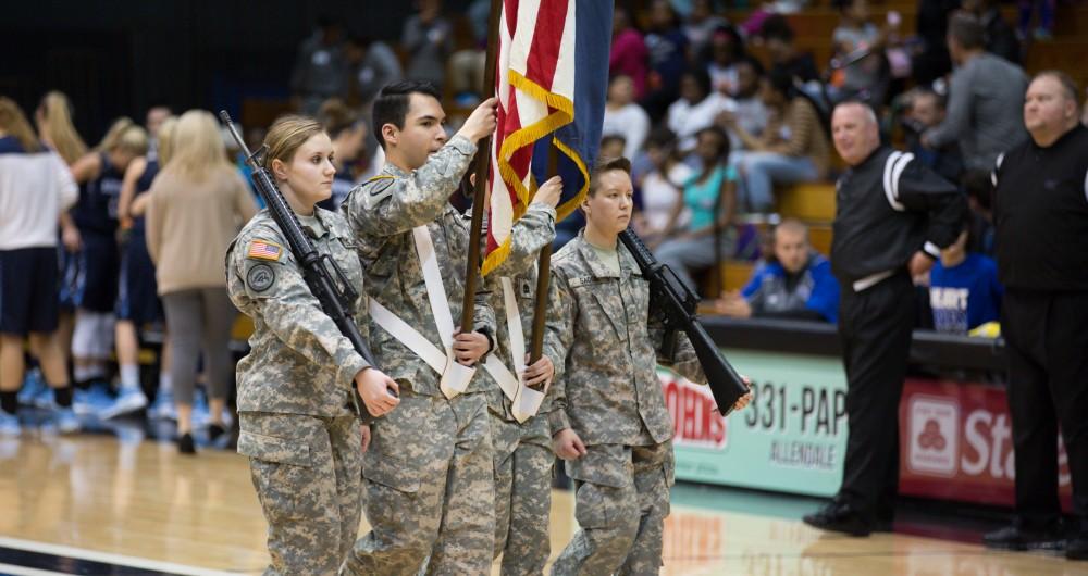 GVL / Kevin Sielaff - Members of Western Michigan's ROTC unit present colors before the start of the match. The Lakers down the Timberwolves of Northwood University in Allendale with a final score of 71-47 Jan. 24, 2016.