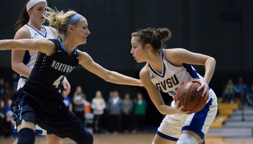 GVL / Kevin Sielaff - Bailey Cairnduff (34) holds the ball on the arch.  The Lakers down the Timberwolves of Northwood University in Allendale with a final score of 71-47 Jan. 24, 2016.