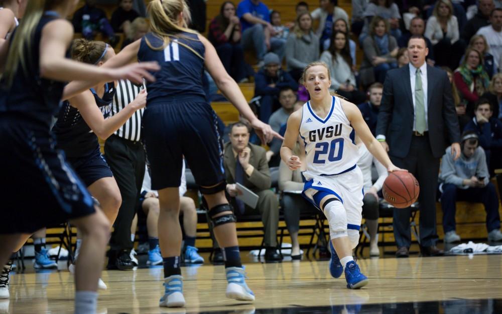 GVL / Kevin Sielaff - Janae Langs (20) cuts the ball into the paint.  The Lakers down the Timberwolves of Northwood University in Allendale with a final score of 71-47 Jan. 24, 2016.