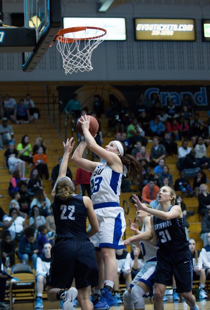 GVL / Kevin Sielaff - Kayla Dawson (23) tries a lay-up in the post.  The Lakers down the Timberwolves of Northwood University in Allendale with a final score of 71-47 Jan. 24, 2016.