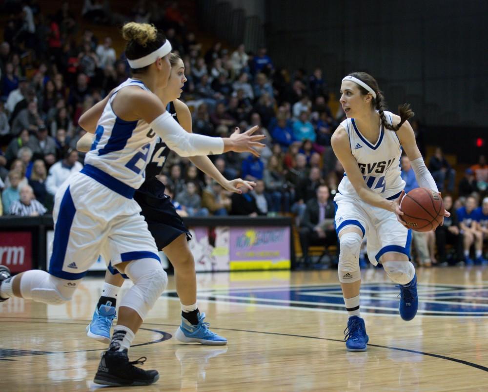 GVL / Kevin Sielaff - Korynn Hincka (44) passes the ball to Brionna Barnett (22).  The Lakers down the Timberwolves of Northwood University in Allendale with a final score of 71-47 Jan. 24, 2016.