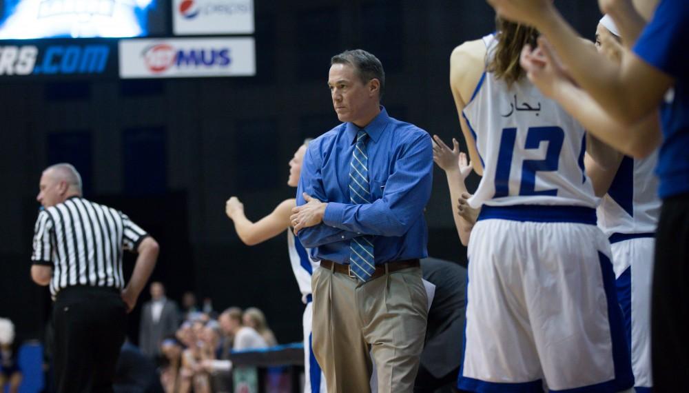 GVL / Kevin Sielaff - Head coach Mike Williams watches a play unfold.  The Lakers down the Timberwolves of Northwood University in Allendale with a final score of 71-47 Jan. 24, 2016.