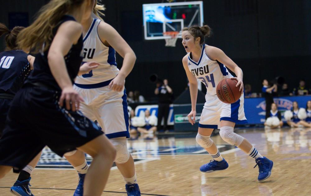 GVL / Kevin Sielaff - Bailey Cairnduff (34) moves the ball around the arch.  The Lakers down the Timberwolves of Northwood University in Allendale with a final score of 71-47 Jan. 24, 2016.