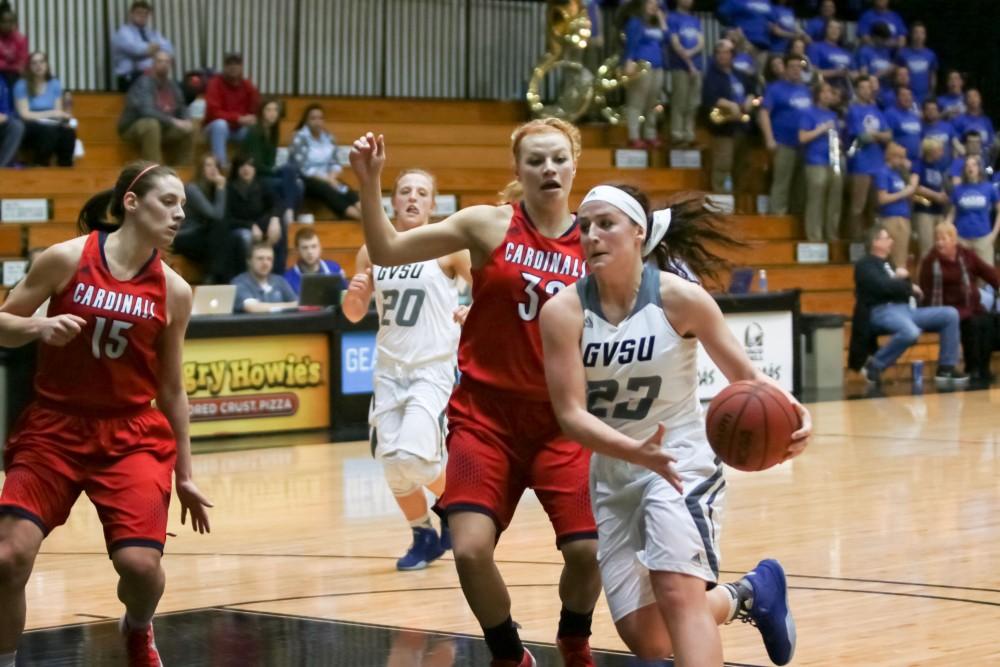 GVL / Sara Carte - Kayla Dawson (23) makes her way to the hoop against Saginaw Valley in the Fieldhouse Arena on Thursday, Feb. 18, 2016.