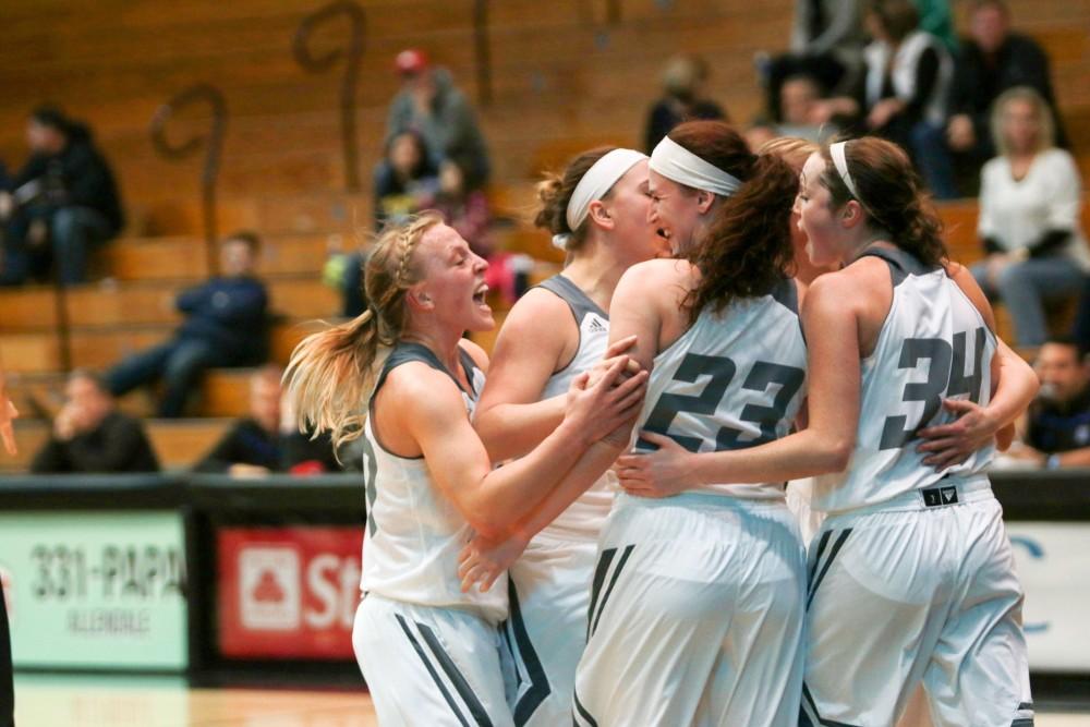 GVL / Sara Carte - The Grand Valley Women’s Basketball team celebrates after a score against Saginaw Valley in the Fieldhouse Arena on Thursday, Feb. 18, 2016.