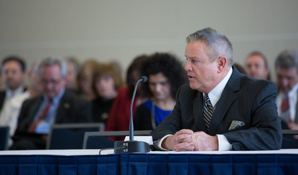 GVL / Kevin Sielaff - Tim Wood, vice president for charter schools, speaks at the Board of Trustees meeting on Friday, Feb. 12, 2016 in the Seidman College of Business on Grand Valley's Pew Campus.