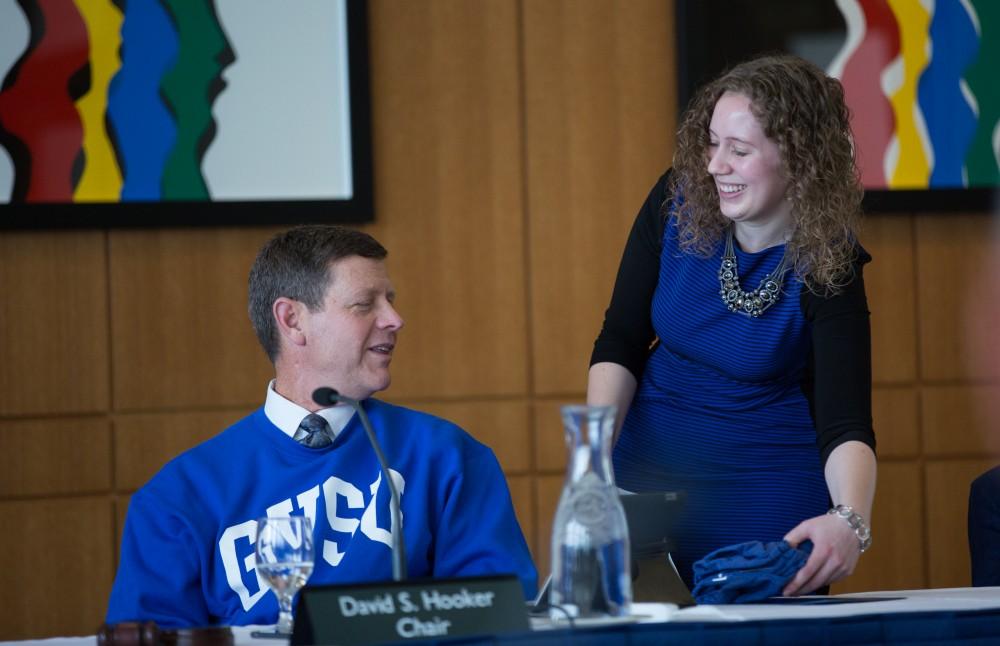 GVL / Kevin Sielaff - David Hooker receives a Laker Effect tee shirt at the Board of Trustees meeting on Friday, Feb. 12, 2016 in the Seidman College of Business on Grand Valley's Pew Campus.