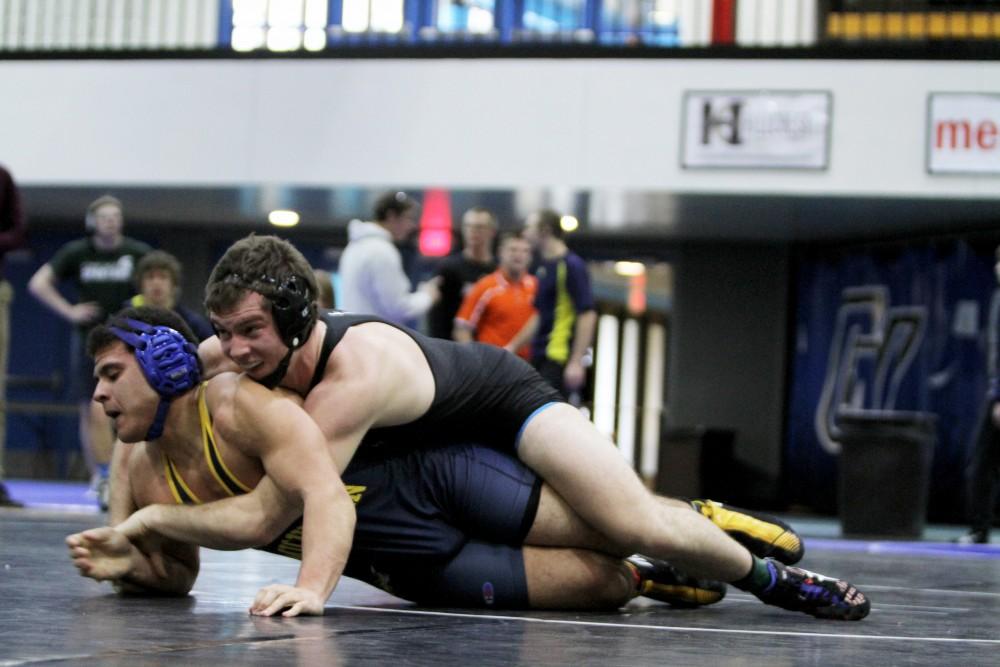 Eric Dietz competes a student from the University of Michigan in club wrestling on Feb. 6 in Allendale, MI. 