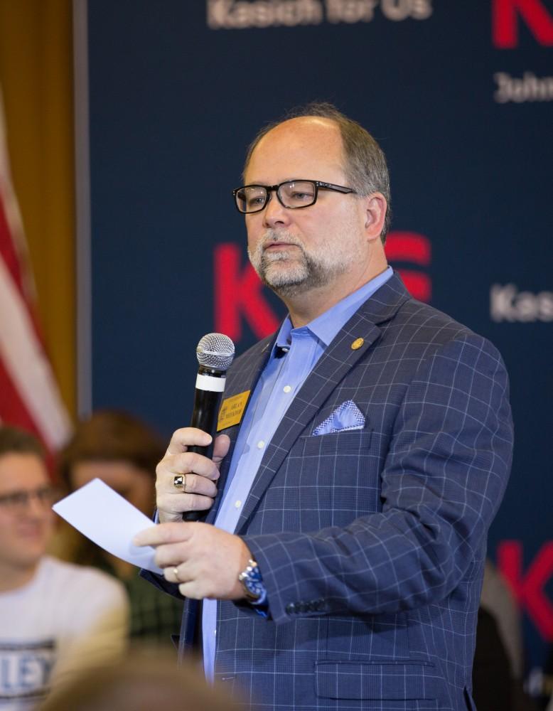 GVL / Kevin Sielaff - Michigan Senate Majority Leader Arlan Meekhof introduces John Kasich.  Governor of Ohio and Republican presidential hopeful John Kasich speaks inside the Grand River Room in Kirkhof Monday, Feb. 15, 2016.